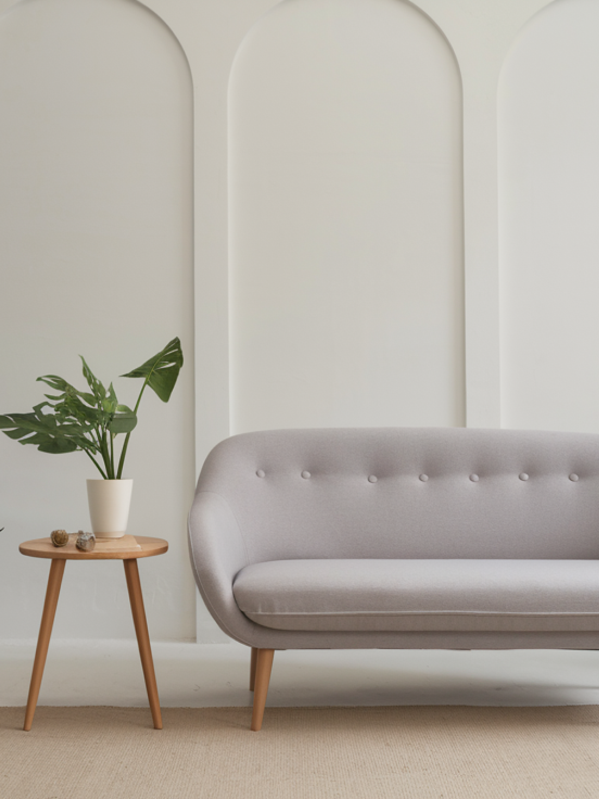 Gray one-seater sofa and wooden coffee table